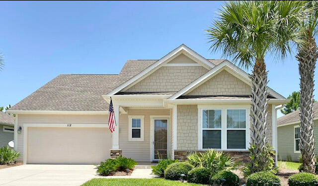112 Blue Sage Road Panama City Beach, FL 32413 - Photo 1 of 46 front view of a house with a yard