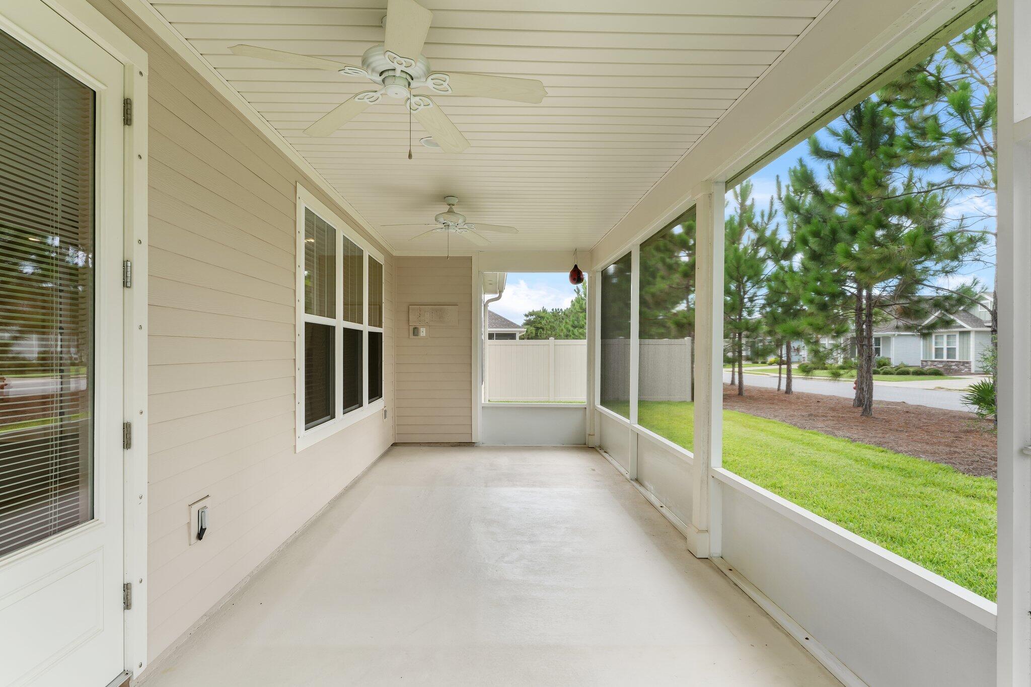 112 Blue Sage Road Panama City Beach, FL 32413 - Photo 33 of 46 a view of a porch with a backyard