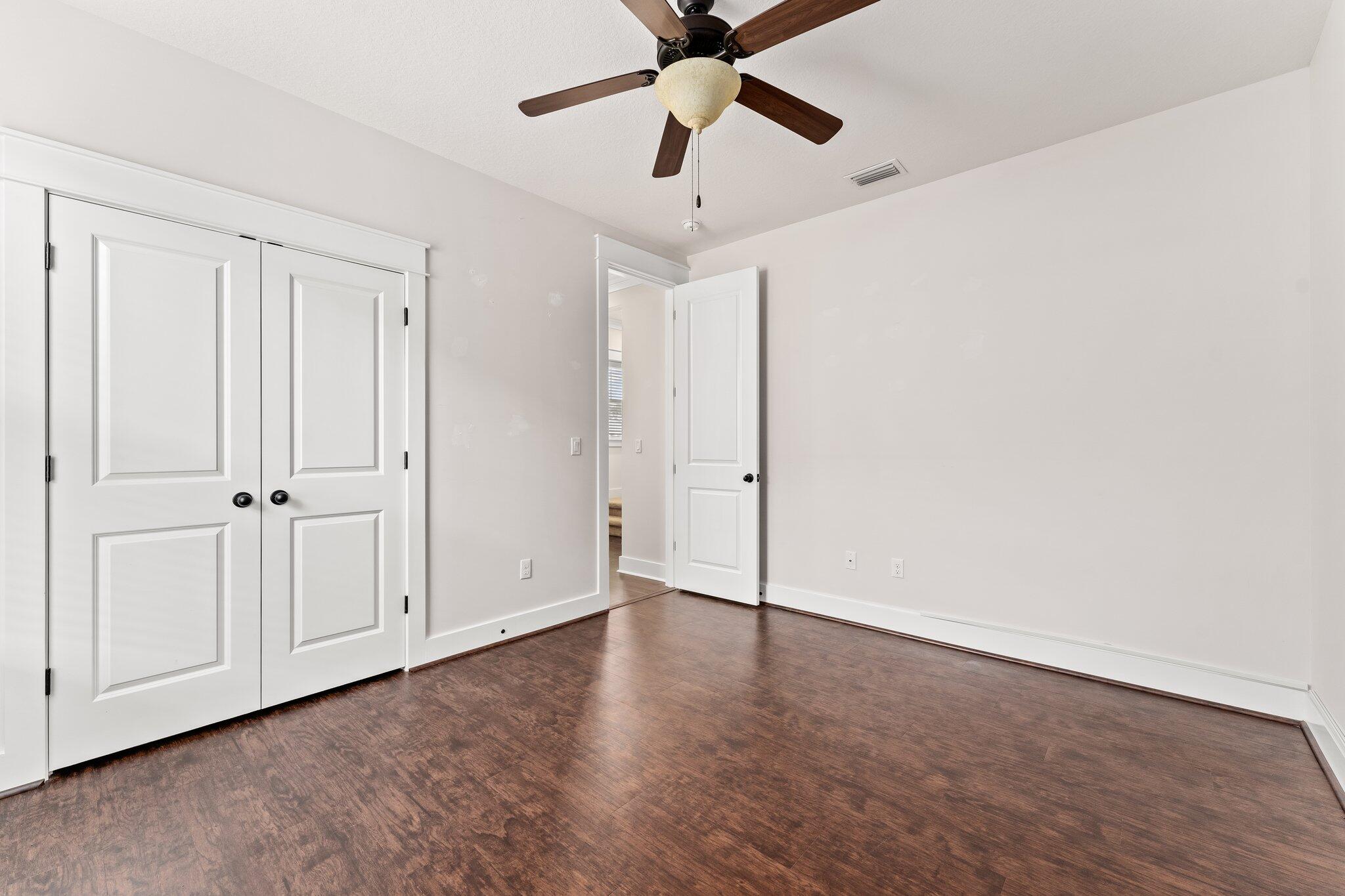 112 Blue Sage Road Panama City Beach, FL 32413 - Photo 10 of 46 a view of an empty room and window