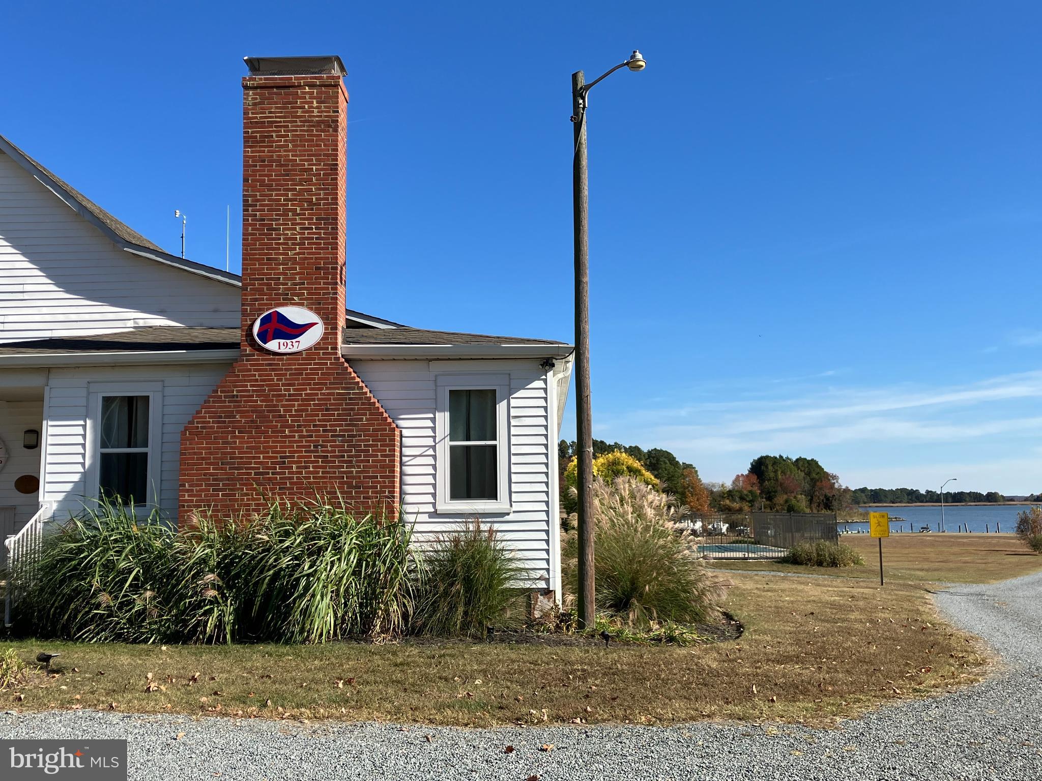Crosby Road Rock Hall, MD 21661 - Photo 10 of 10 a front view of a house with yard