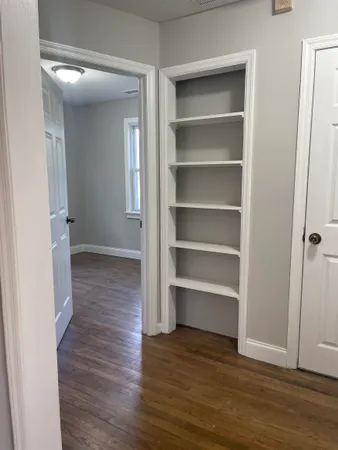 a view of an empty walk in closet