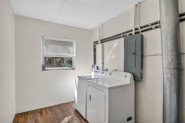 a utility room with dryer and washer