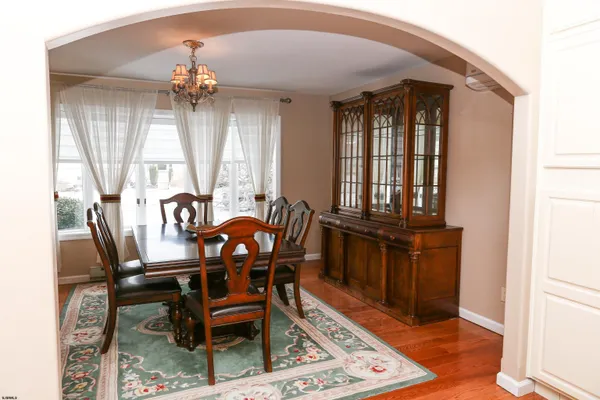 a kitchen with stainless steel appliances a refrigerator sink and cabinets