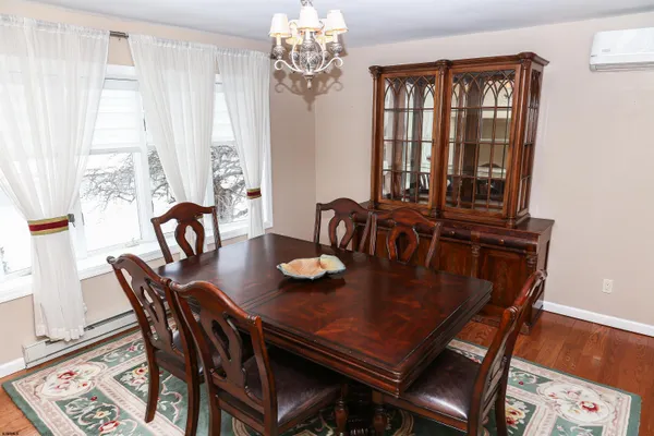 a kitchen with granite countertop a refrigerator stove and sink