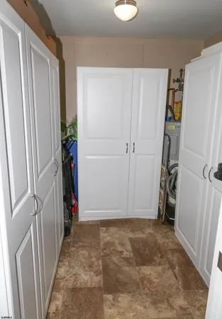a balcony view with a fireplace and a wooden floor