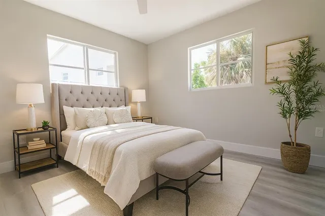 a view of a kitchen with a sink and a refrigerator