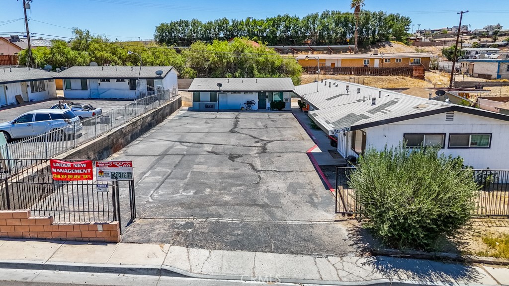 518 West Fredricks Street Barstow, CA 92311 - Photo 2 of 35 a view of a balcony with wooden floor and outdoor space