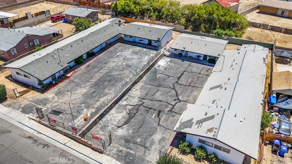 518 West Fredricks Street Barstow, CA 92311 - Photo 3 of 35 an aerial view of a house with a garden