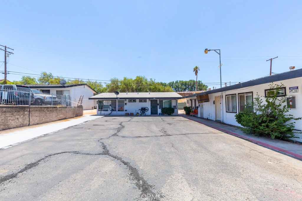 518 West Fredricks Street Barstow, CA 92311 - Photo 10 of 35 a view of a house with a patio