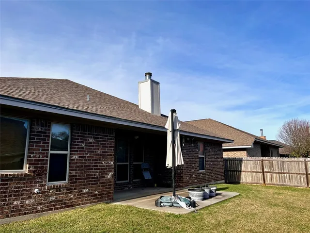 a front view of a house with garage
