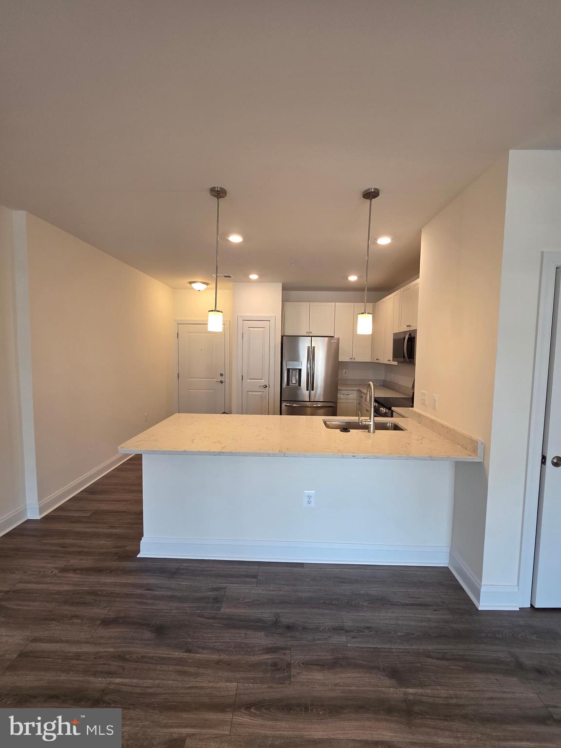 404 Bold Ruler Court, Unit 204 Havre de Grace, MD 21078 - Photo 23 of 31 a view of kitchen with wooden floor
