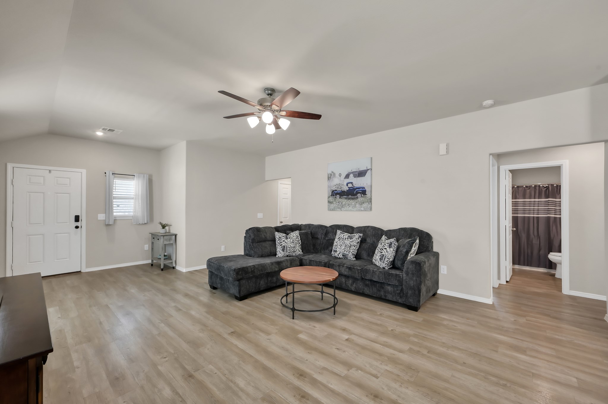 514 Dalloway Street Conroe, TX 77316 - Photo 8 of 27 Open living room designed for comfort and everyday living