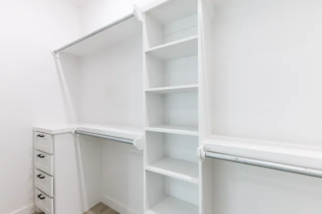 a close up view of walk in closet