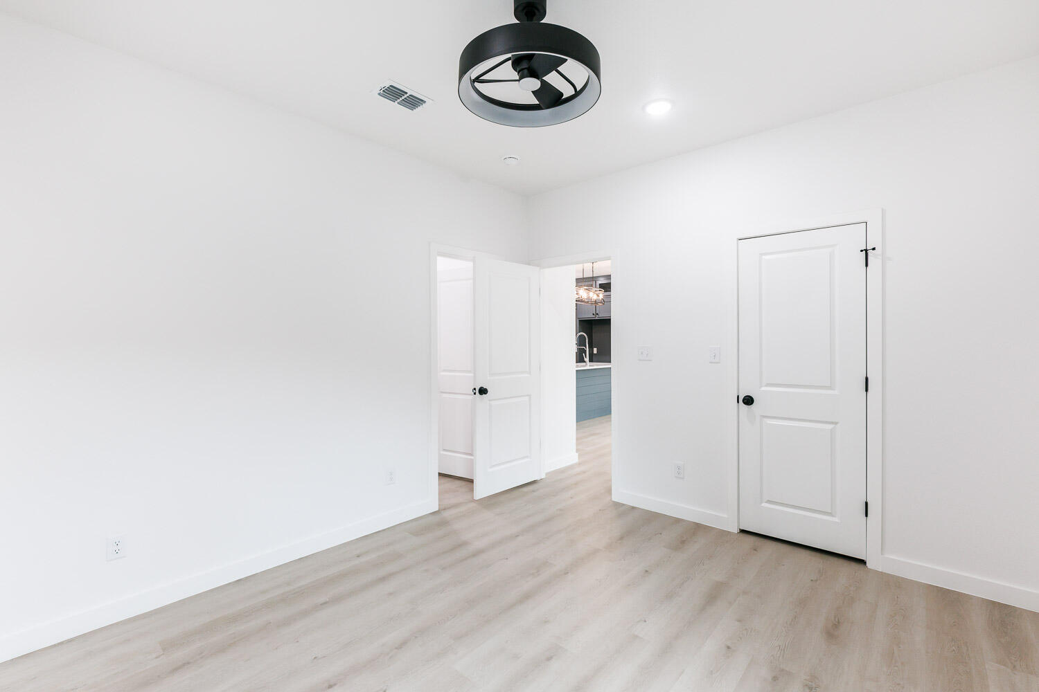 1704 Elkhart Avenue, Unit A Lubbock, TX 79416 - Photo 38 of 44 a view of a room with wooden floor