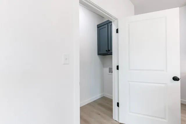 a view of entryway with wooden floor