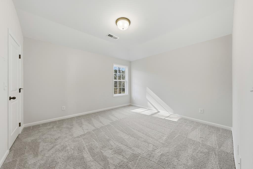 1304 McAlpine Ridge Auburn, AL 36830 - Photo 21 of 34 a view of an empty room with a window