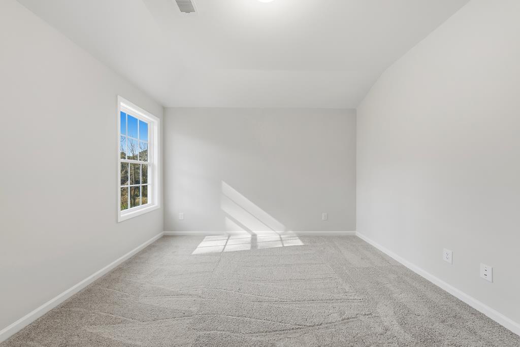 1304 McAlpine Ridge Auburn, AL 36830 - Photo 22 of 34 a view of an empty room with a window