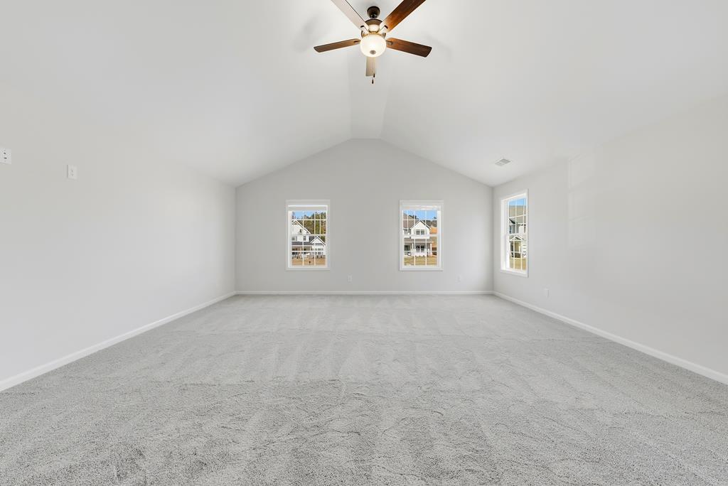 1304 McAlpine Ridge Auburn, AL 36830 - Photo 27 of 34 an empty room with windows and fan