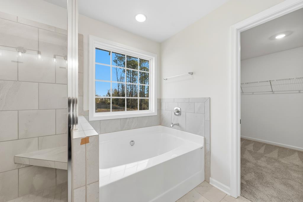 1304 McAlpine Ridge Auburn, AL 36830 - Photo 29 of 34 a bathroom with a bathtub and shower