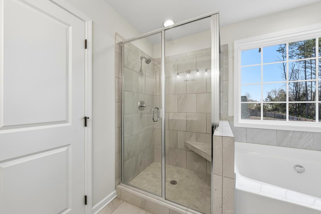 1304 McAlpine Ridge Auburn, AL 36830 - Photo 30 of 34 a bathroom with a shower and a bathtub