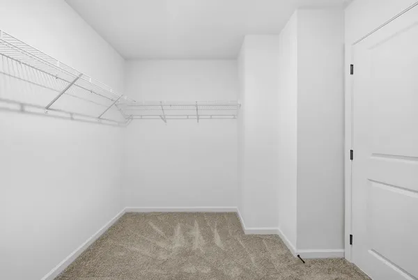 a bathroom with a double vanity sink and mirror
