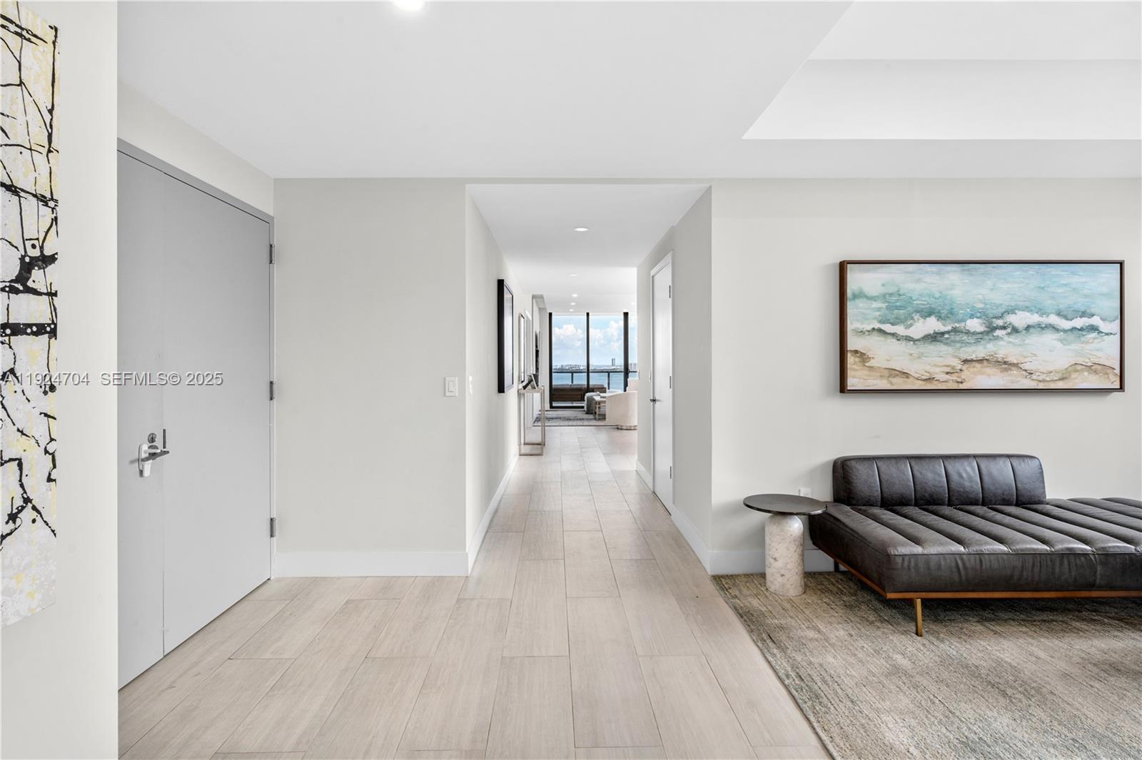 788 Northeast 23rd Street, Unit 2201 Miami, FL 33137 - Photo 13 of 29 a view of livingroom with furniture and window