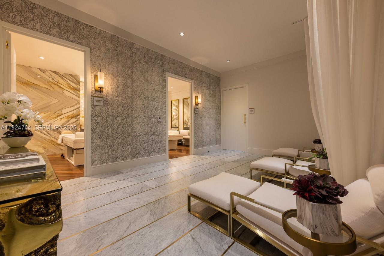 788 Northeast 23rd Street, Unit 2201 Miami, FL 33137 - Photo 18 of 29 a living room with furniture and a gate