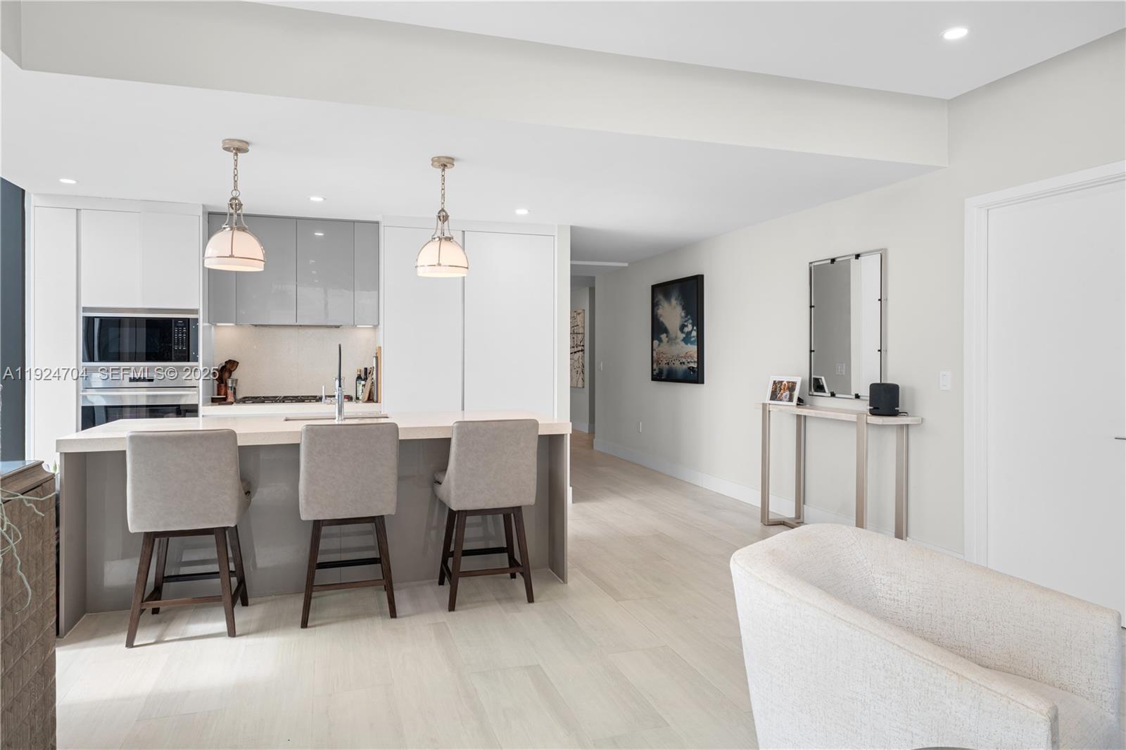 788 Northeast 23rd Street, Unit 2201 Miami, FL 33137 - Photo 6 of 29 a view of kitchen with breakfast area