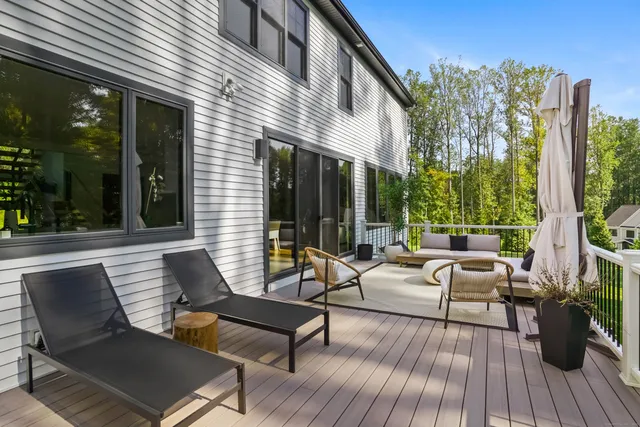 a view of a patio with couches and potted plants
