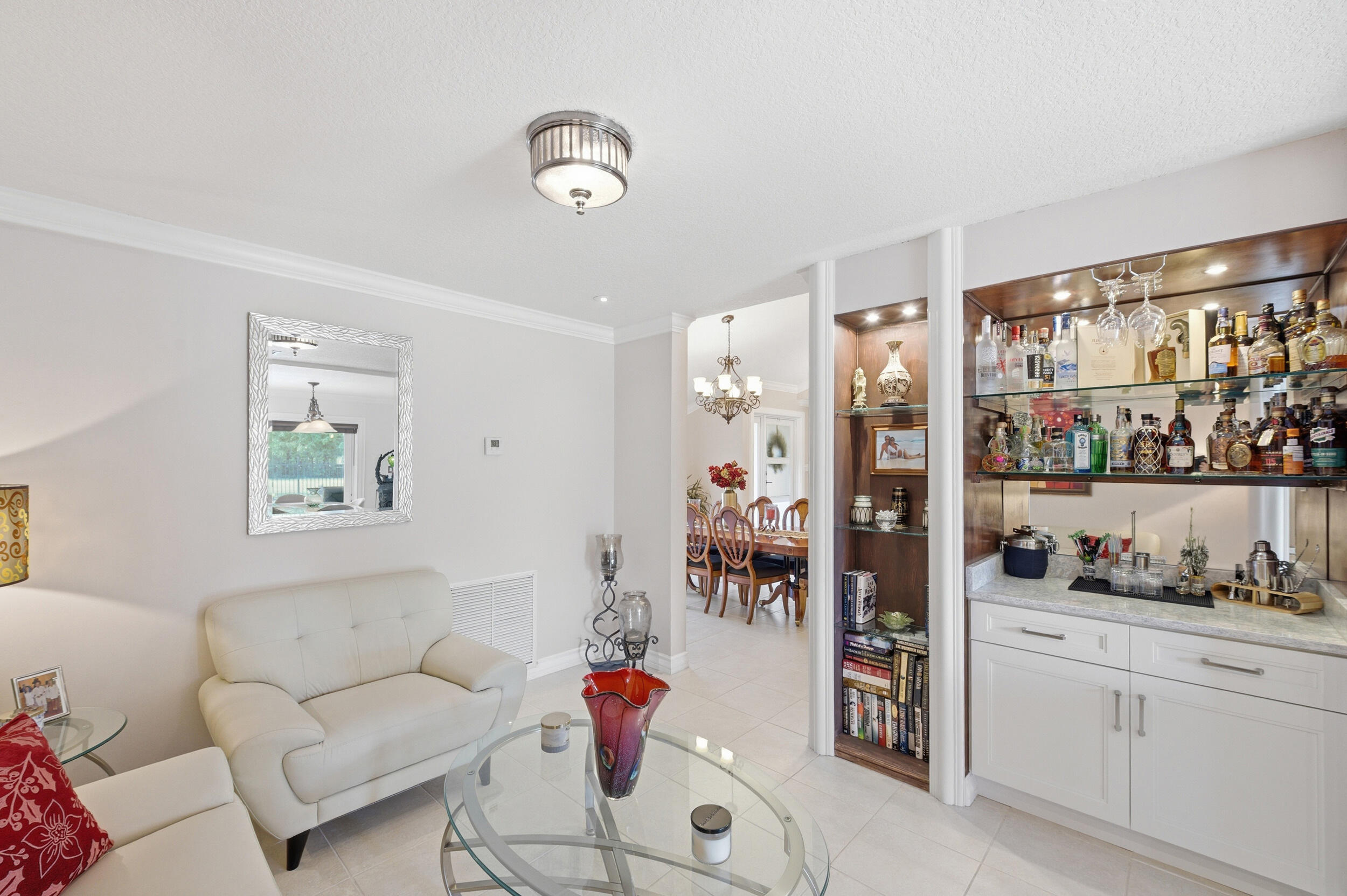 4780 Brandywine Drive Boca Raton, FL 33487 - Photo 14 of 43 a living room with furniture and decor