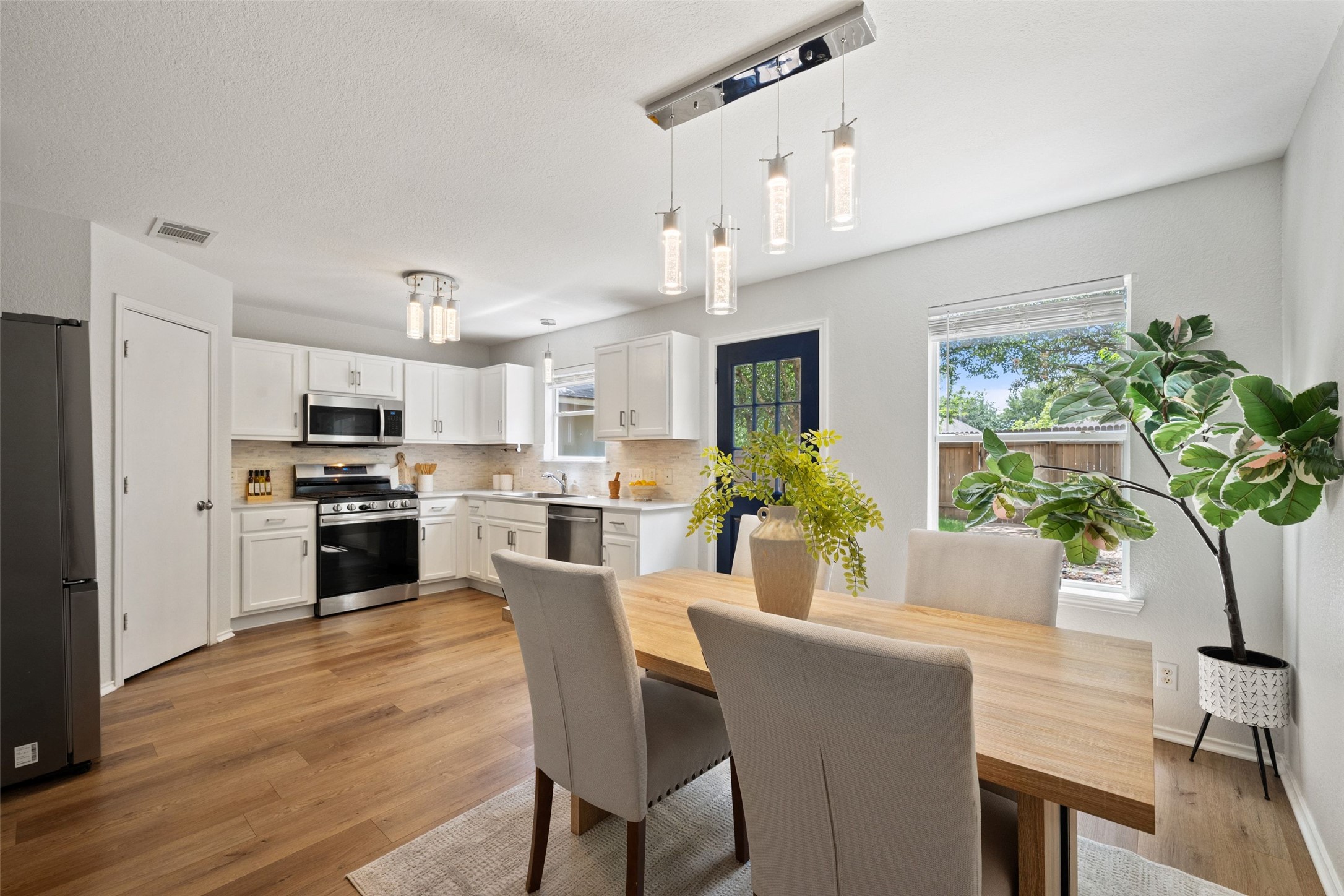 4529 Best Way Austin, TX 78725 - Photo 7 of 34 View of kitchen from dining area corner