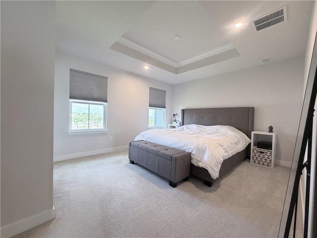 120 Crown Street McKees Rocks, PA 15136 - Photo 20 of 28 a spacious bedroom with a bed and a window