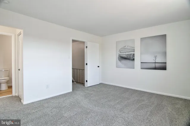 a bathroom with a double vanity sink and mirror