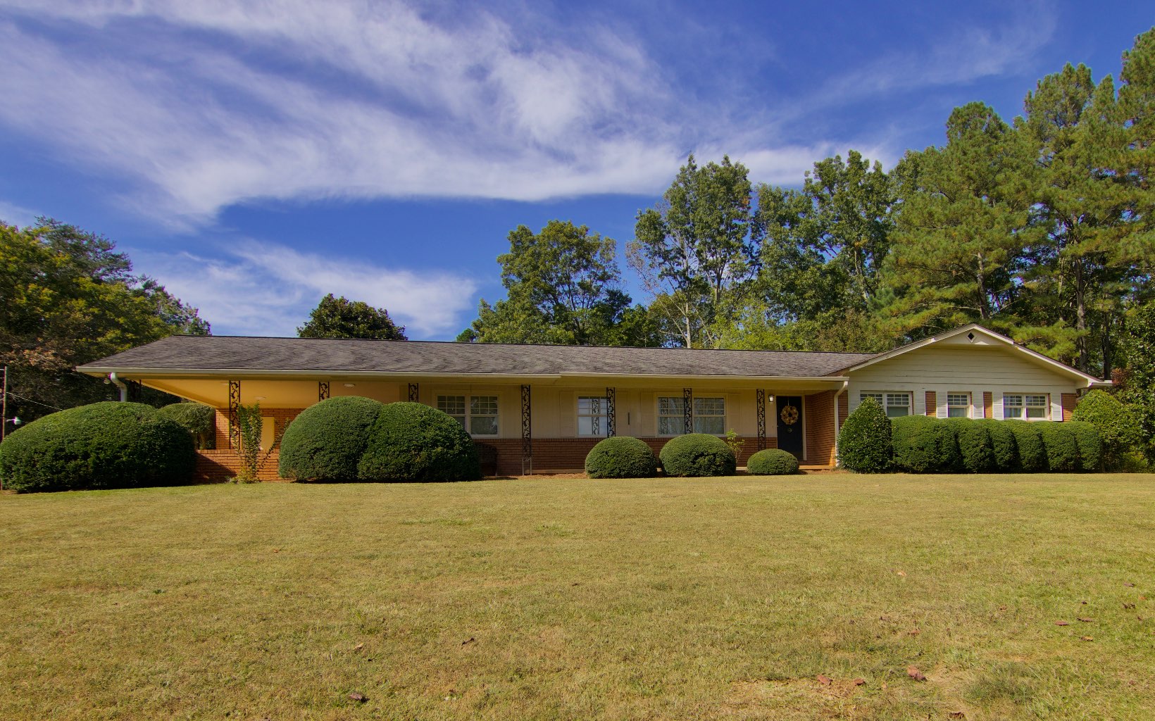 2136 Madola Road Epworth, GA 30541 - Photo 1 of 1 a front view of house with yard and green space