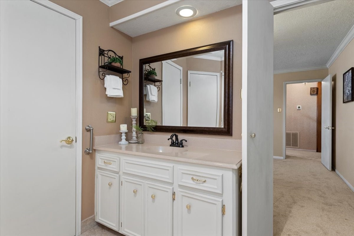 16707 Rugby Court Spring, TX 77379 - Photo 26 of 48 The primary bathroom offers two separate sink areas and a tub/shower combo. The neutral colors make this room timeless and relaxing.