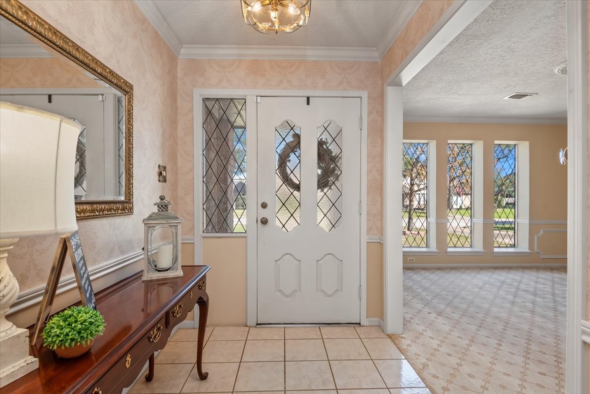 16707 Rugby Court Spring, TX 77379 - Photo 6 of 48 The front entry way provides access to the formal dining room. Perfect for entertaining!