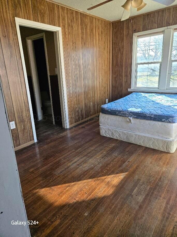 1104 South Western Street Amarillo, TX 79106 - Photo 13 of 24 a bedroom with a bed and a window