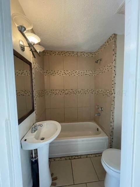 1104 South Western Street Amarillo, TX 79106 - Photo 22 of 24 a bathroom with a sink and toilet