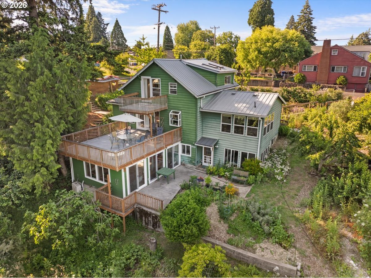 772 Division Street Oregon City, OR 97045 - Photo 2 of 47 an aerial view of residential houses and trees