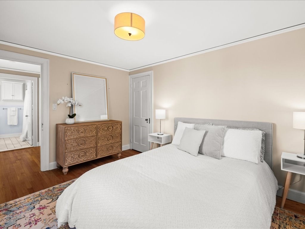 25 Pickwick Road Marblehead, MA 01945 - Photo 23 of 42 a bedroom with a bed and a dresser