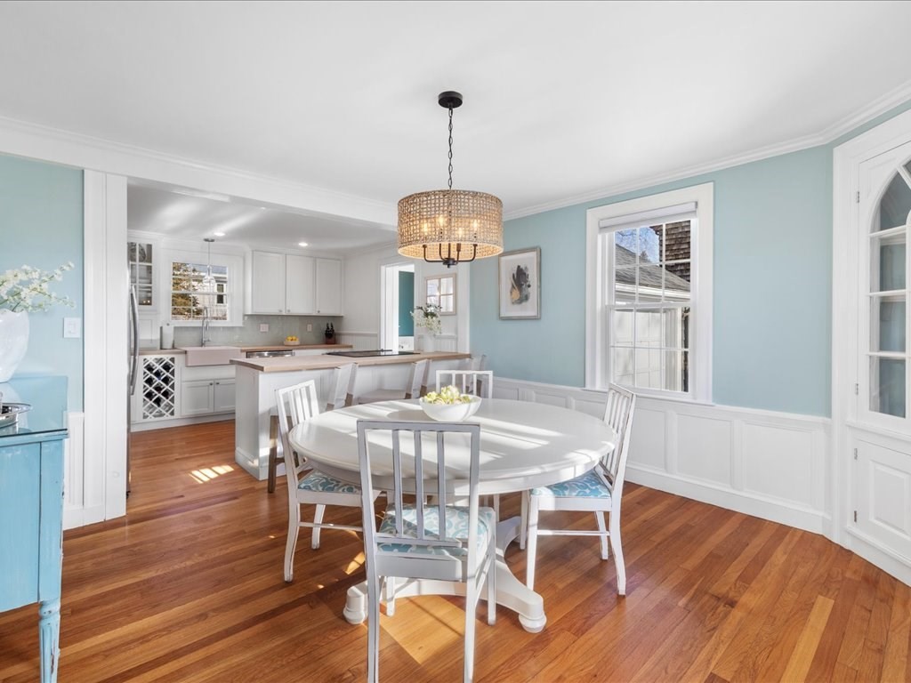 25 Pickwick Road Marblehead, MA 01945 - Photo 9 of 42 a view of a dining room with furniture window and wooden floor
