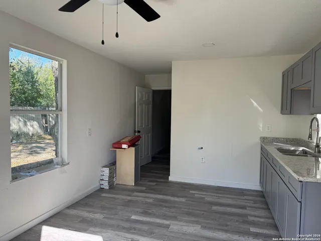 a view of kitchen and utility room