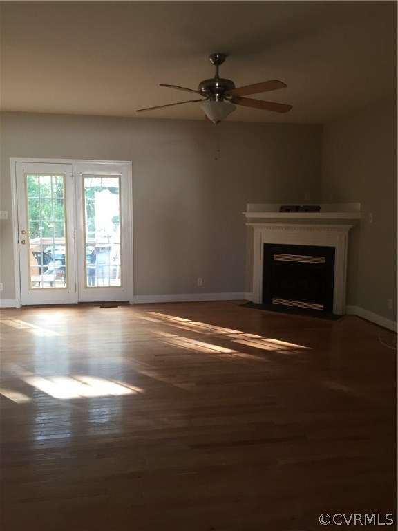 5801 Springmount Road Chesterfield, VA 23832 - Photo 3 of 4 a view of empty room with wooden floor and fan