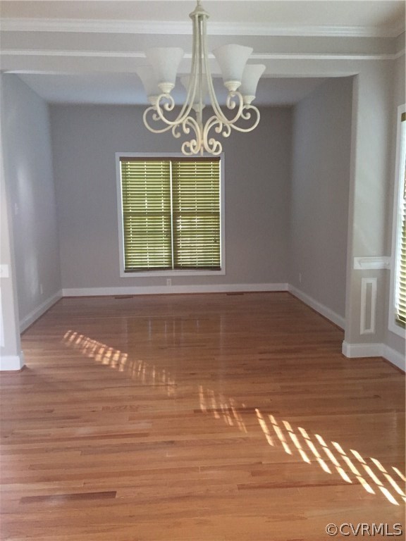 5801 Springmount Road Chesterfield, VA 23832 - Photo 4 of 4 a view of an empty room with wooden floor and a window