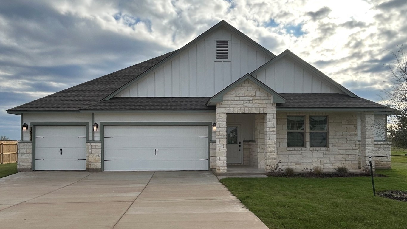 a front view of house with yard