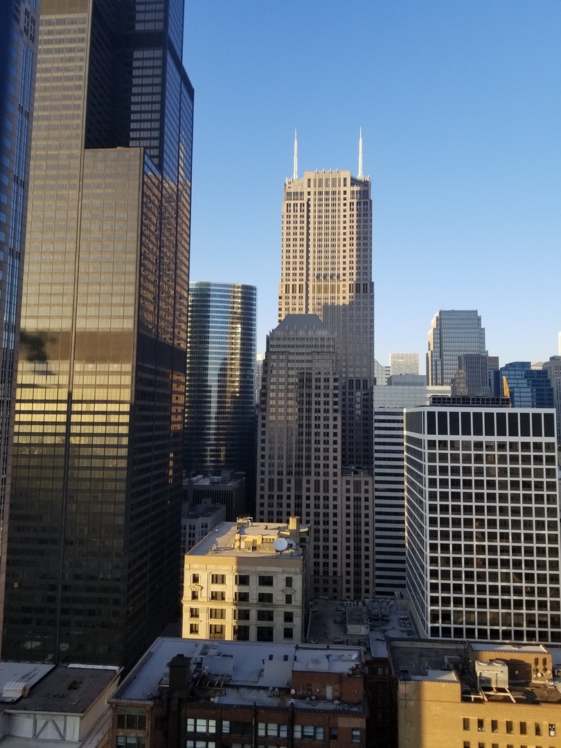 235 West Van Buren Street, Unit 3420 Chicago, IL 60607 - Photo 14 of 18 a view of a buildings with city street