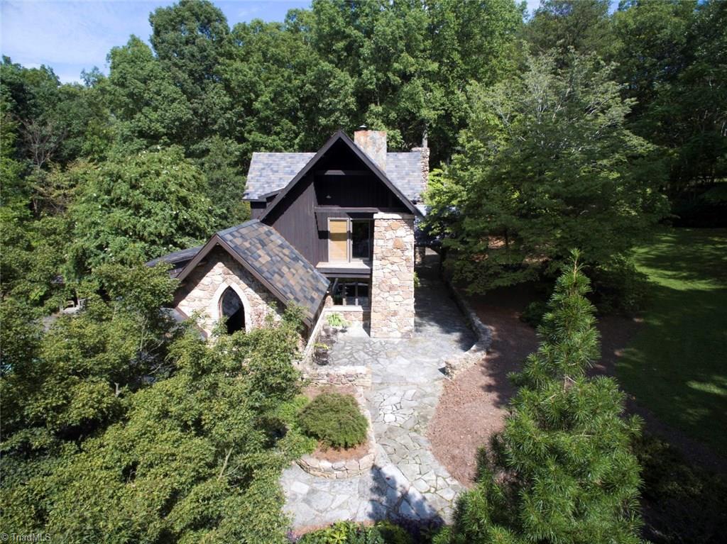 6111 Meadow Bluff Lane Oak Ridge, NC 27310 - Photo 1 of 30 If you travel to the beat of a different drummer, this house just might be the one! Situated in the heart of 6+ private acres in sought after Oak Ridge. Local Oak Ridge Elementary, Northwest Middle and High School.