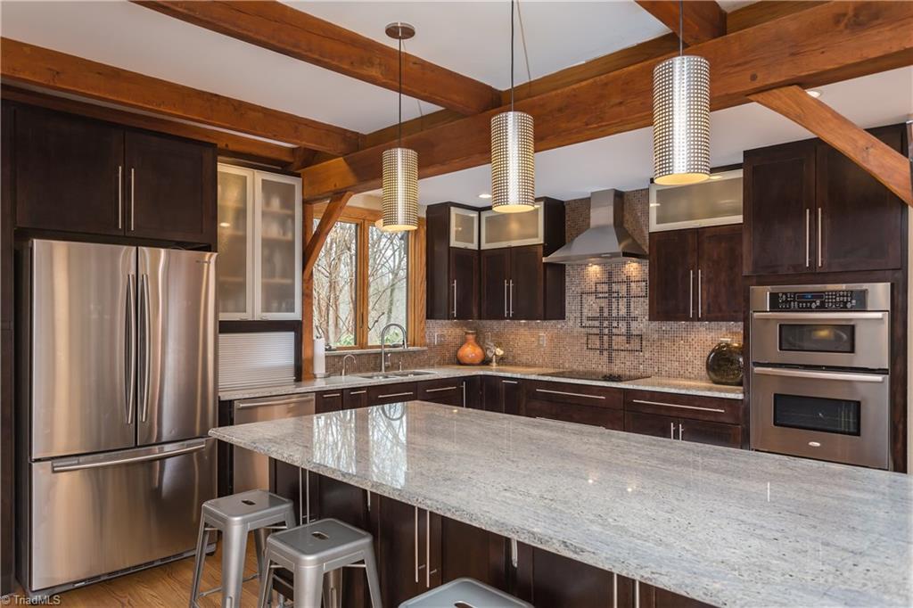 6111 Meadow Bluff Lane Oak Ridge, NC 27310 - Photo 13 of 30 Another view of the kitchen.