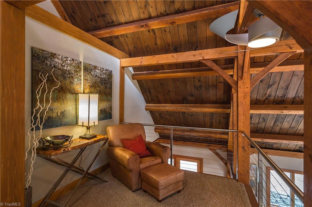 6111 Meadow Bluff Lane Oak Ridge, NC 27310 - Photo 19 of 30 This loft overlooks the large great room. A quiet spot to still enjoy the wood fire, just outside the master bedroom.