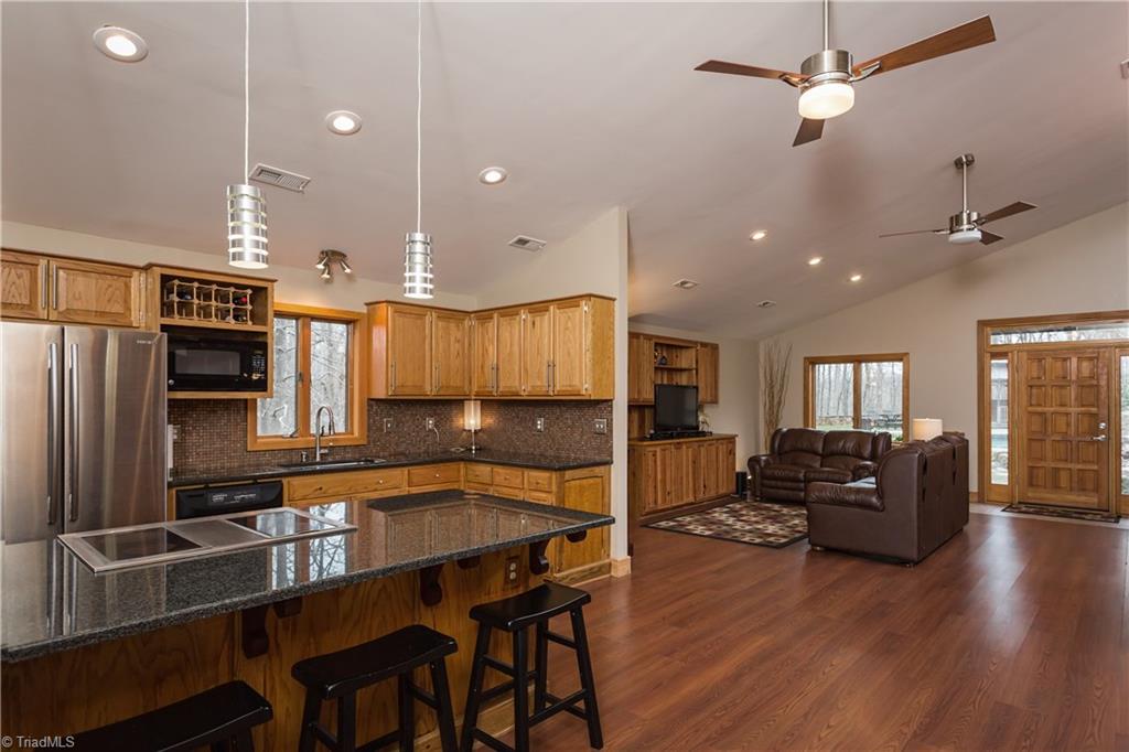 6111 Meadow Bluff Lane Oak Ridge, NC 27310 - Photo 25 of 30 The kitchen in the guest house. Again, nothing spared!